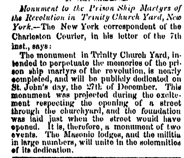 A black-and-white newspaper clipping titled “Monument to the Prison Ship Martyrs of the Revolution in Trinity Church Yard, New York.” The article reports that a monument honoring American prisoners who died on British prison ships during the Revolutionary War is nearly completed and will be dedicated on St. John’s Day, December 27.
