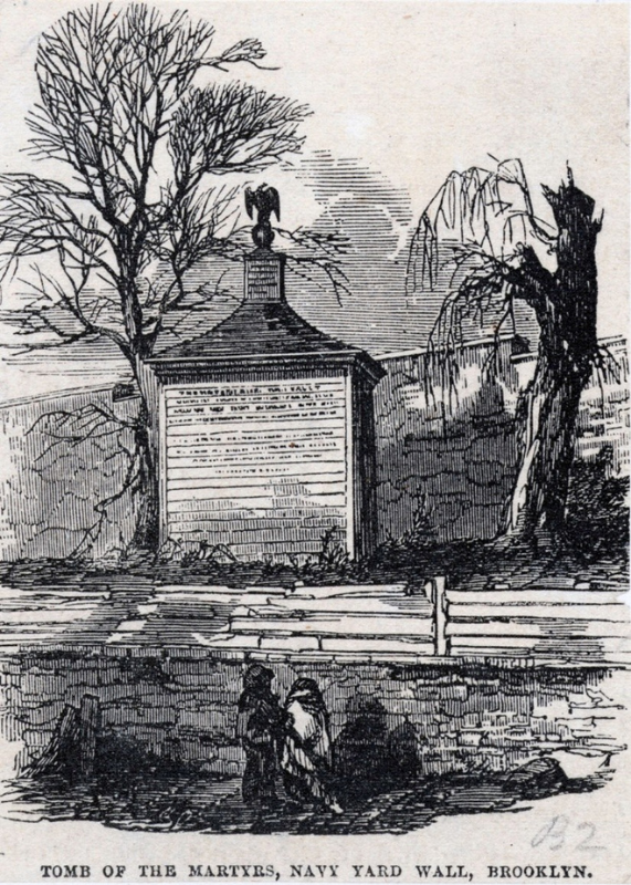 "A 19th-century black-and-white engraving depicting the Tomb of the Martyrs near the Navy Yard wall in Brooklyn. The small monument, topped with an eagle statue, stands between two leafless trees and behind a low wooden fence. An inscription panel is visible on the front of the tomb’s structure. Two figures, possibly mourners, kneel or stand solemnly before it.